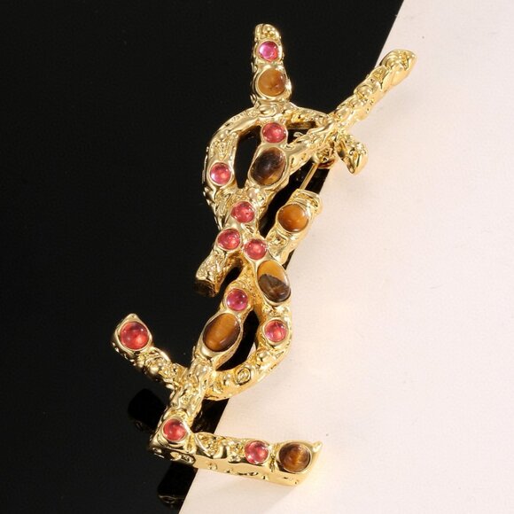 Saint Laurent brooches - Picture 1 of 5